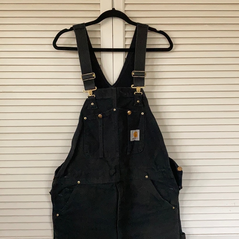 Men’s black carhartt coveralls with gold hardware